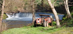 Tractor at waterfall